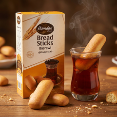 Hamdan Basrawi bread sticks, crispy Kaak for tea pairing, 14oz, golden baked Middle Eastern snack on a white plate