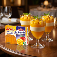 Diala Mango Jelly dessert mix packet, 80g, featuring bright mango images and halal certification for quick tropical treats.