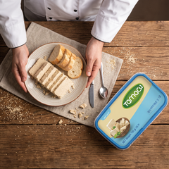 Tamara Vanilla Halva 700g, traditional sesame tahini dessert in a clear plastic package with vanilla flavor, grocery product.