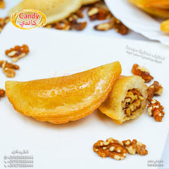 Frozen Candy brand Katayef stuffed with walnuts, sugar, and cinnamon, ready-to-cook Middle Eastern vegetarian dessert pancakes.