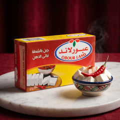 Close-up of Obour Land White Cheese with Chili in a 250g tetra pack, showcasing creamy, spicy feta-style cheese for Middle Eastern dishes.