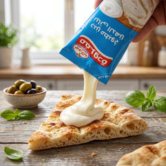 Close-up of Obour Land Ultimate Creamy Cheese Spread bundle featuring Mafrouda squeeze pouches, glass jar, and cheese cup from SANI-LLC