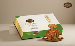 Hamdan Barazek sweets with sesame and pistachio, crispy Damascus-style cookies, shown in a 300g package, ideal for tea or gifting.