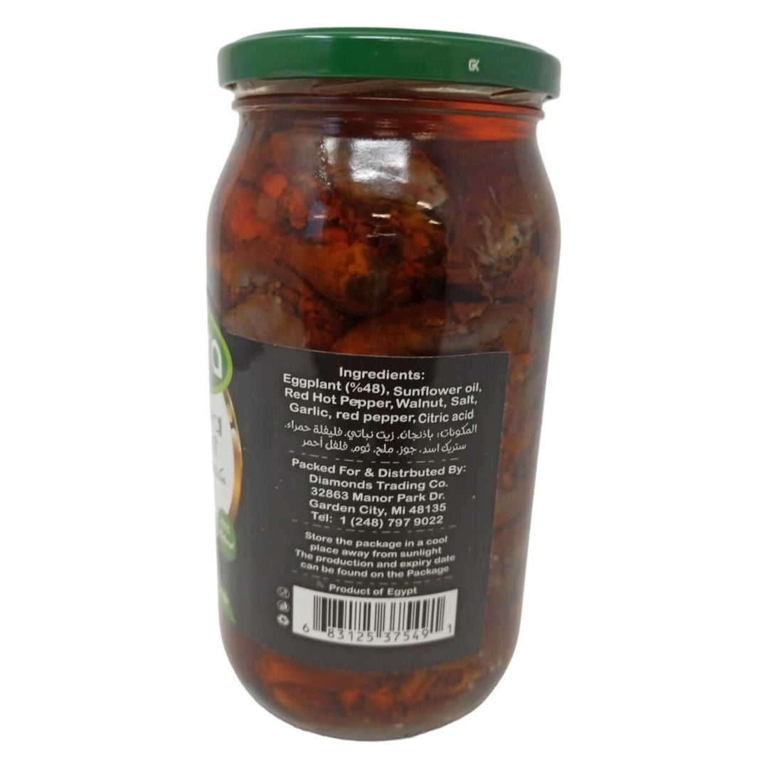 Tamara stuffed eggplant makdous in a jar, ready-to-eat natural Middle Eastern mezza, 1000g grocery product, close-up of the preserved eggplants.