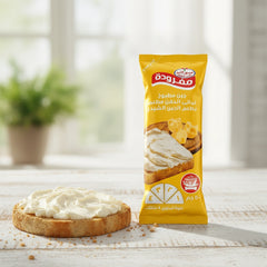 Obour Land Cheddar Cheese Spread in 50g squeeze pouch, 12-pack, creamy yellow cheese for quick snacks and spreads